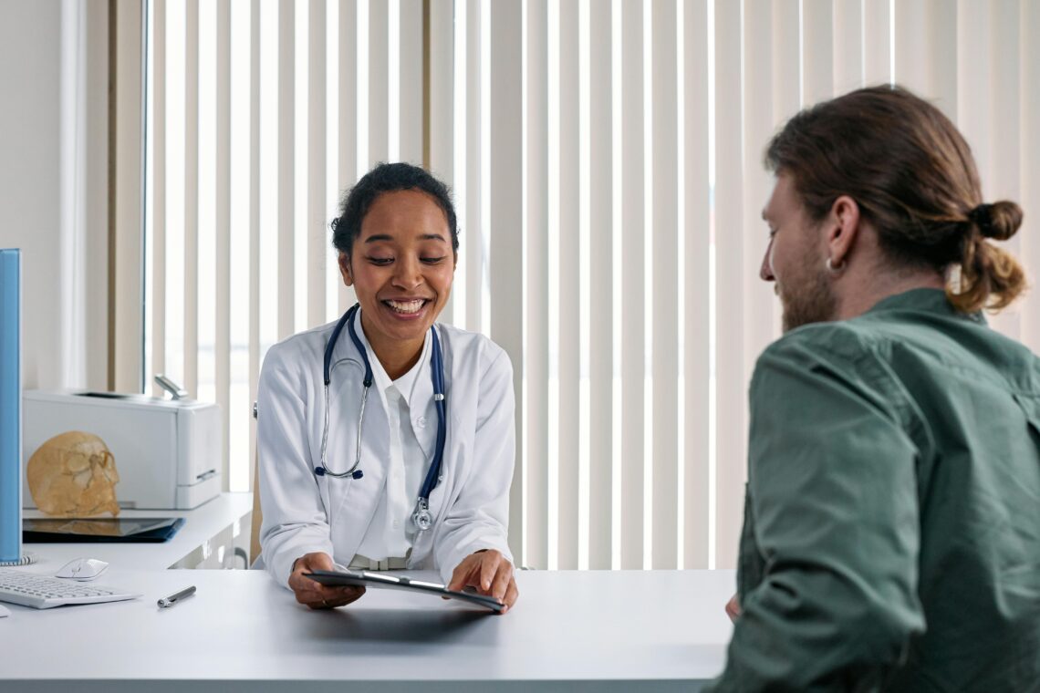 Doctor discussing personalized medical weight loss plan with patient in Salt Lake City clinic